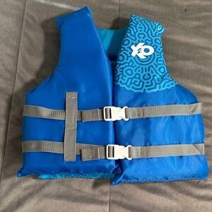 Exxel Kids' blue coast guard certified PFD Life Jacket, Gray Straps 50-90 lbs